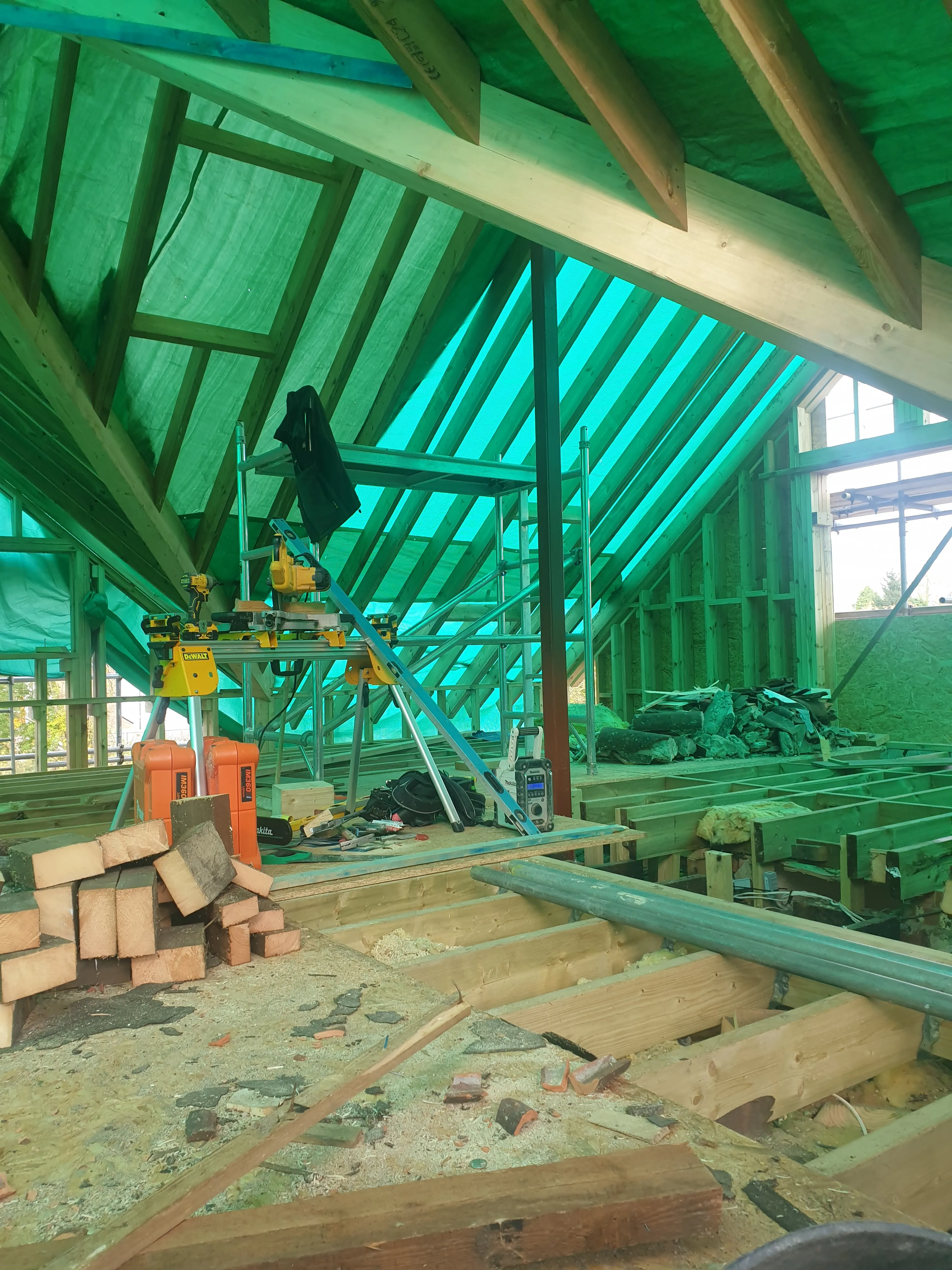 Interior structural work during Somerset loft conversion showing roof timbers